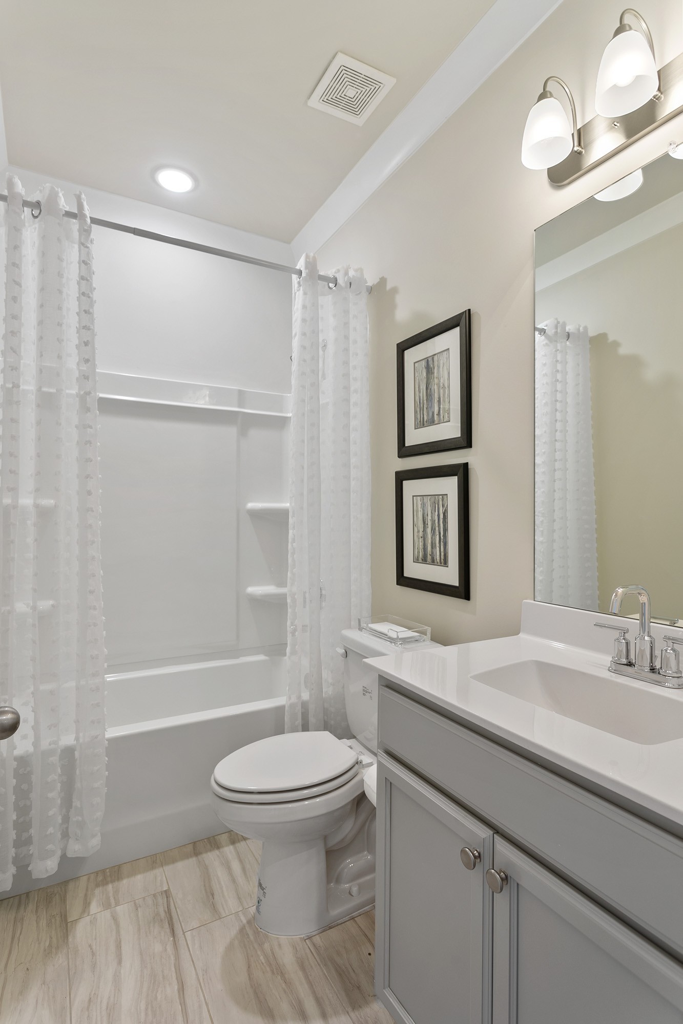 103 Riverview Run Madison, TN 37115 - Photo 7 of 54 a bathroom with a sink a toilet and shower