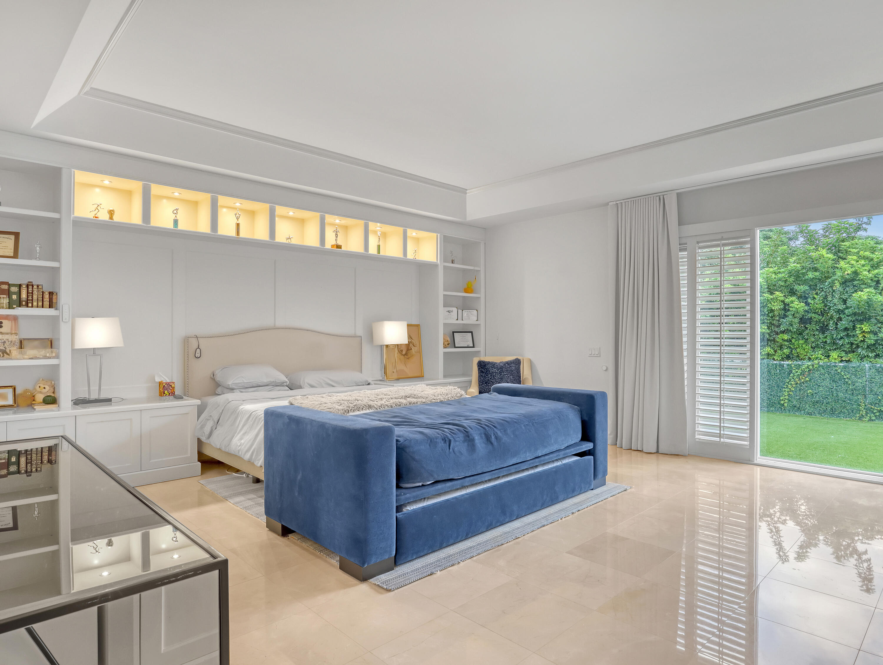 7207 Valencia Drive Boca Raton, FL 33433 - Photo 17 of 32 a bedroom with a large bed and a large window