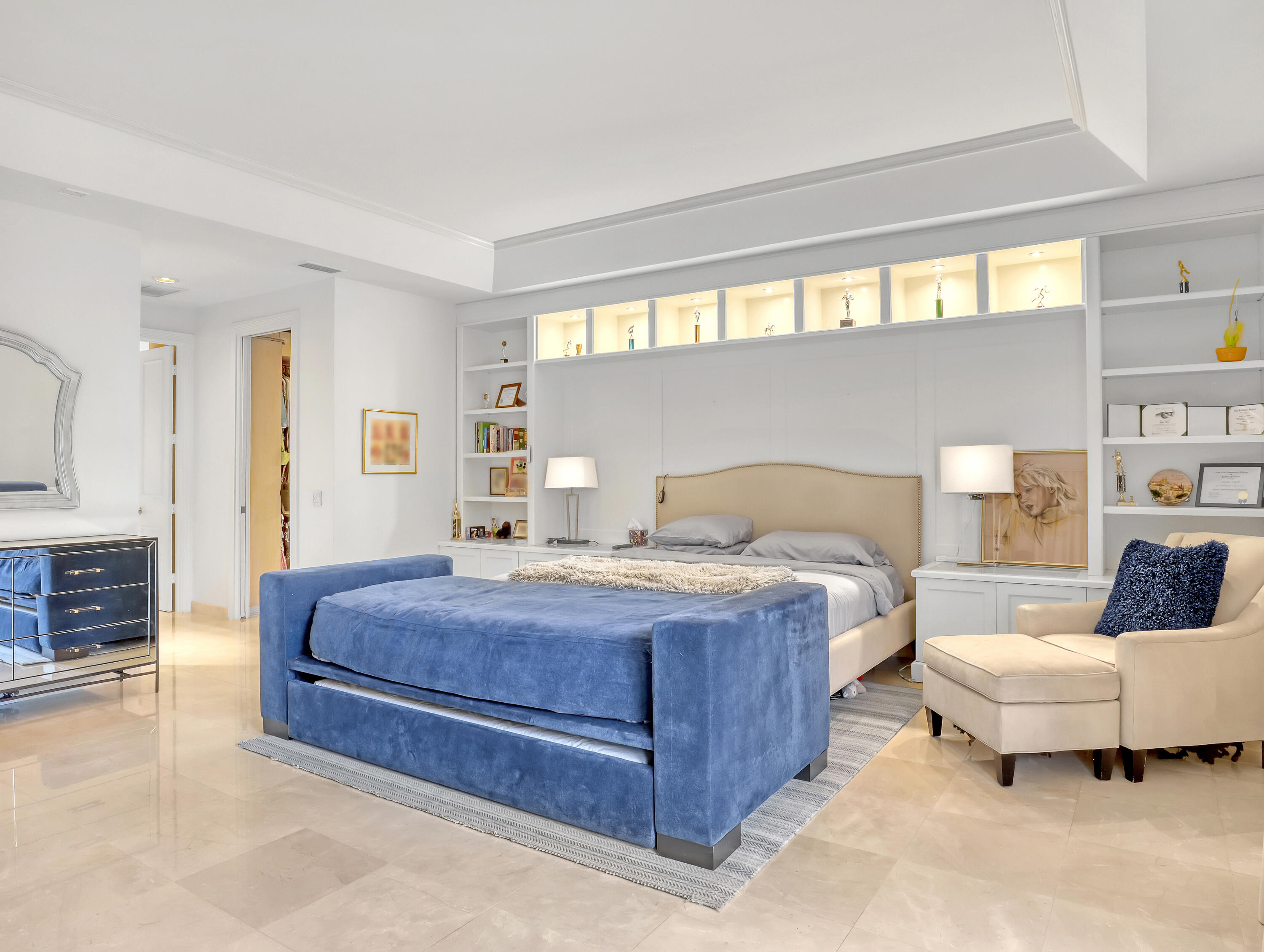 7207 Valencia Drive Boca Raton, FL 33433 - Photo 18 of 32 a bedroom with a large bed and a couch