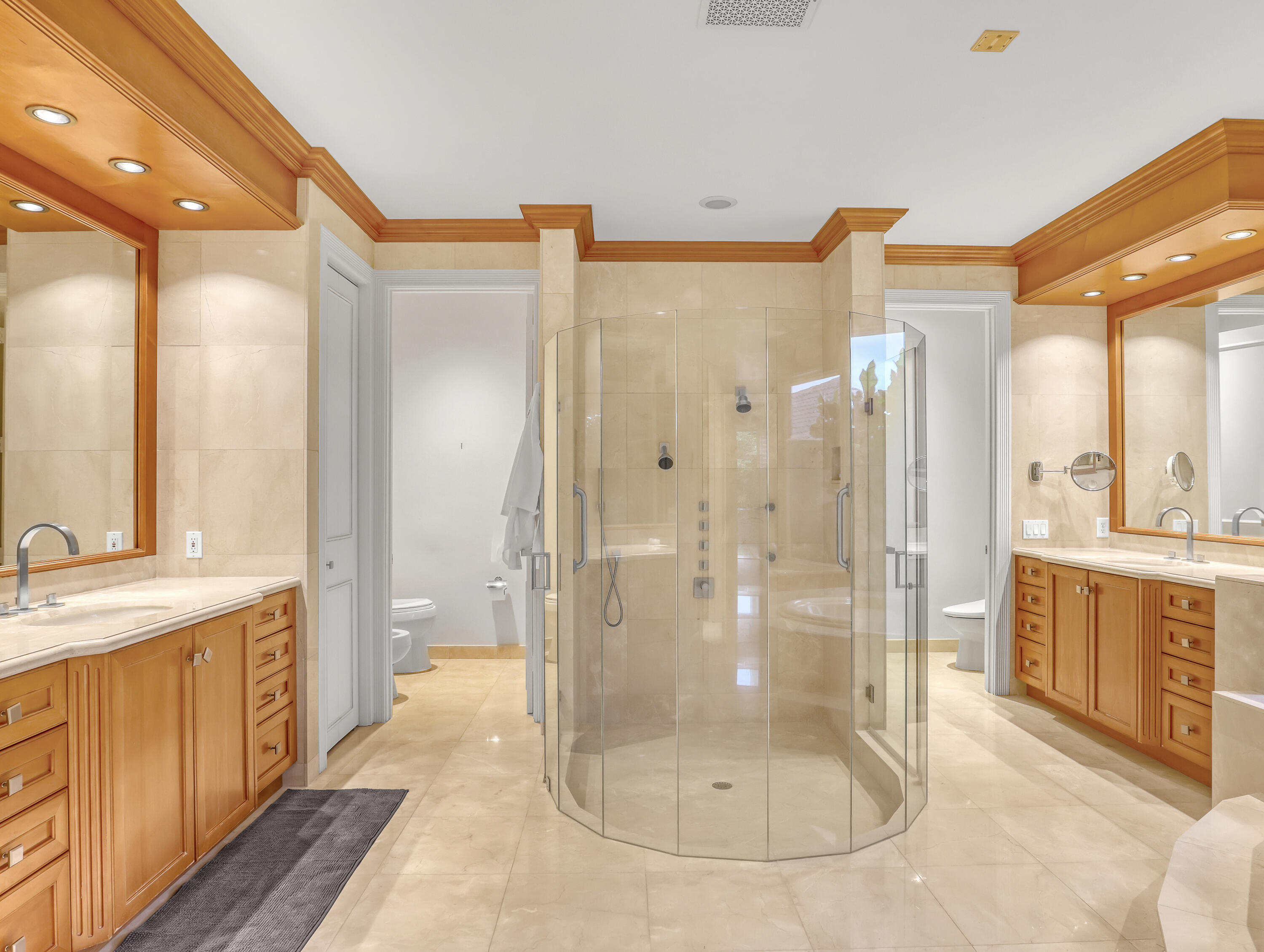 7207 Valencia Drive Boca Raton, FL 33433 - Photo 19 of 32 a bathroom with a glass shower door and a sink