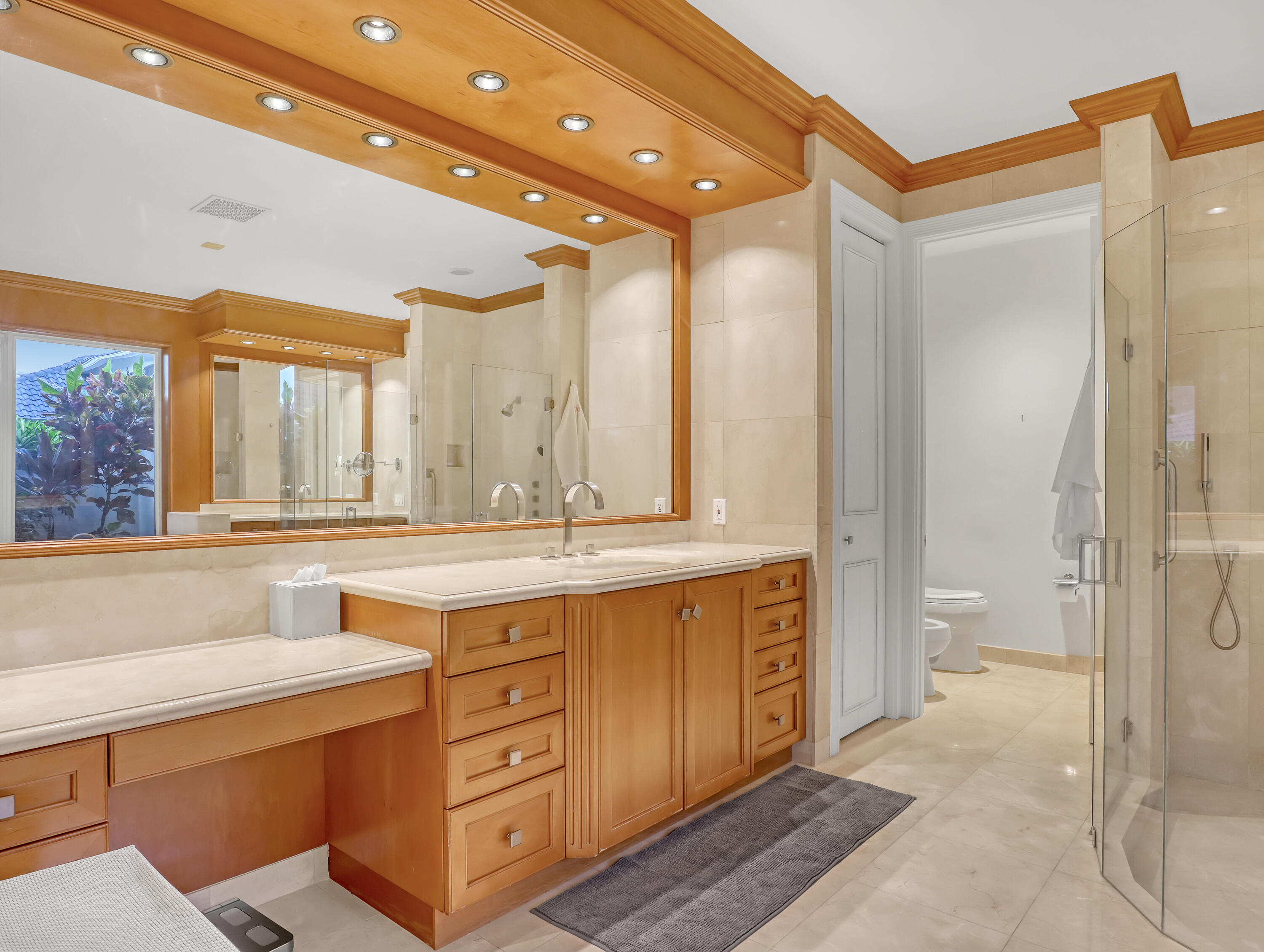 7207 Valencia Drive Boca Raton, FL 33433 - Photo 21 of 32 a bathroom with a granite countertop sink mirror and a bathtub