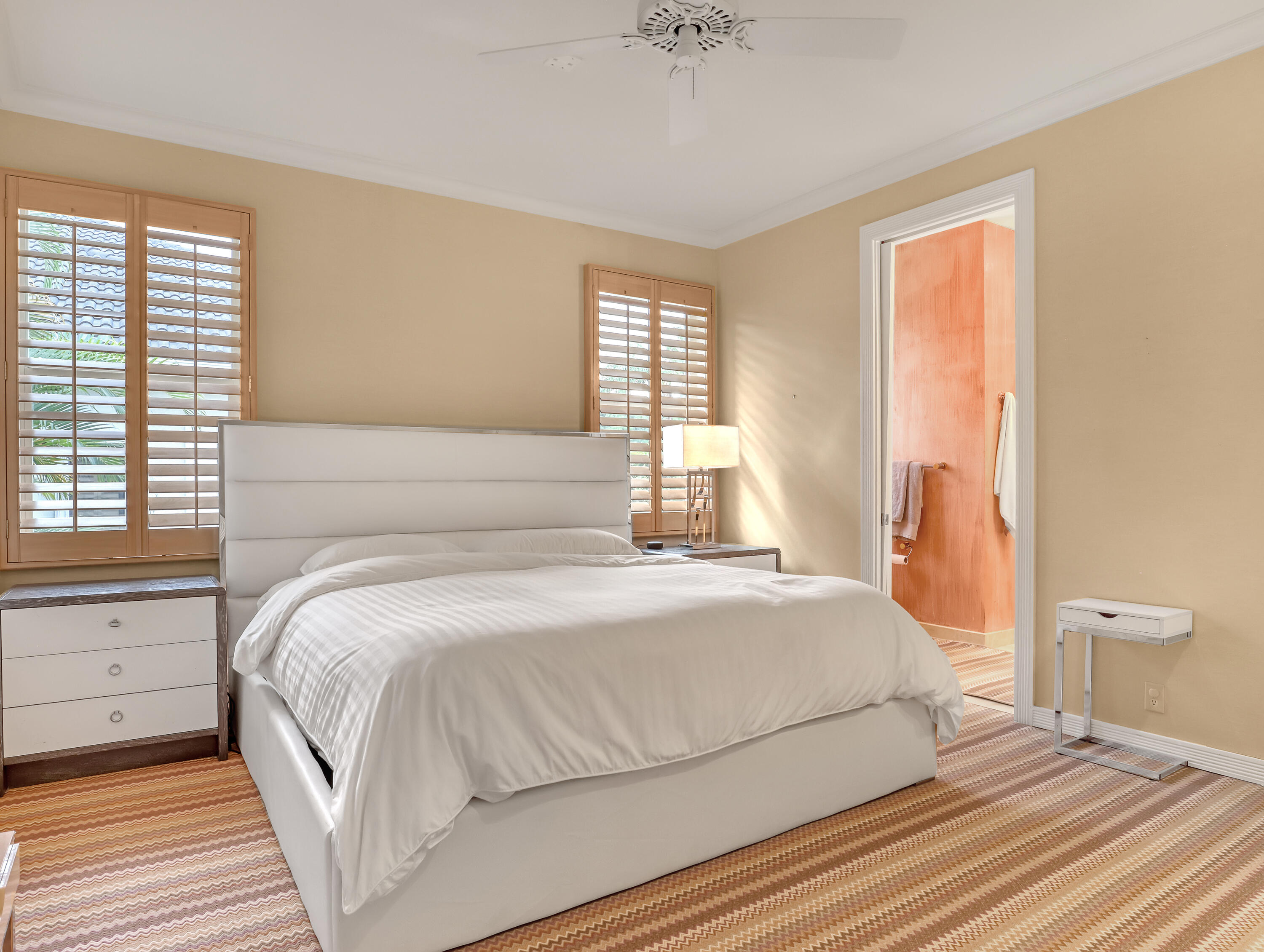 7207 Valencia Drive Boca Raton, FL 33433 - Photo 22 of 32 a bedroom with a bed and a large window