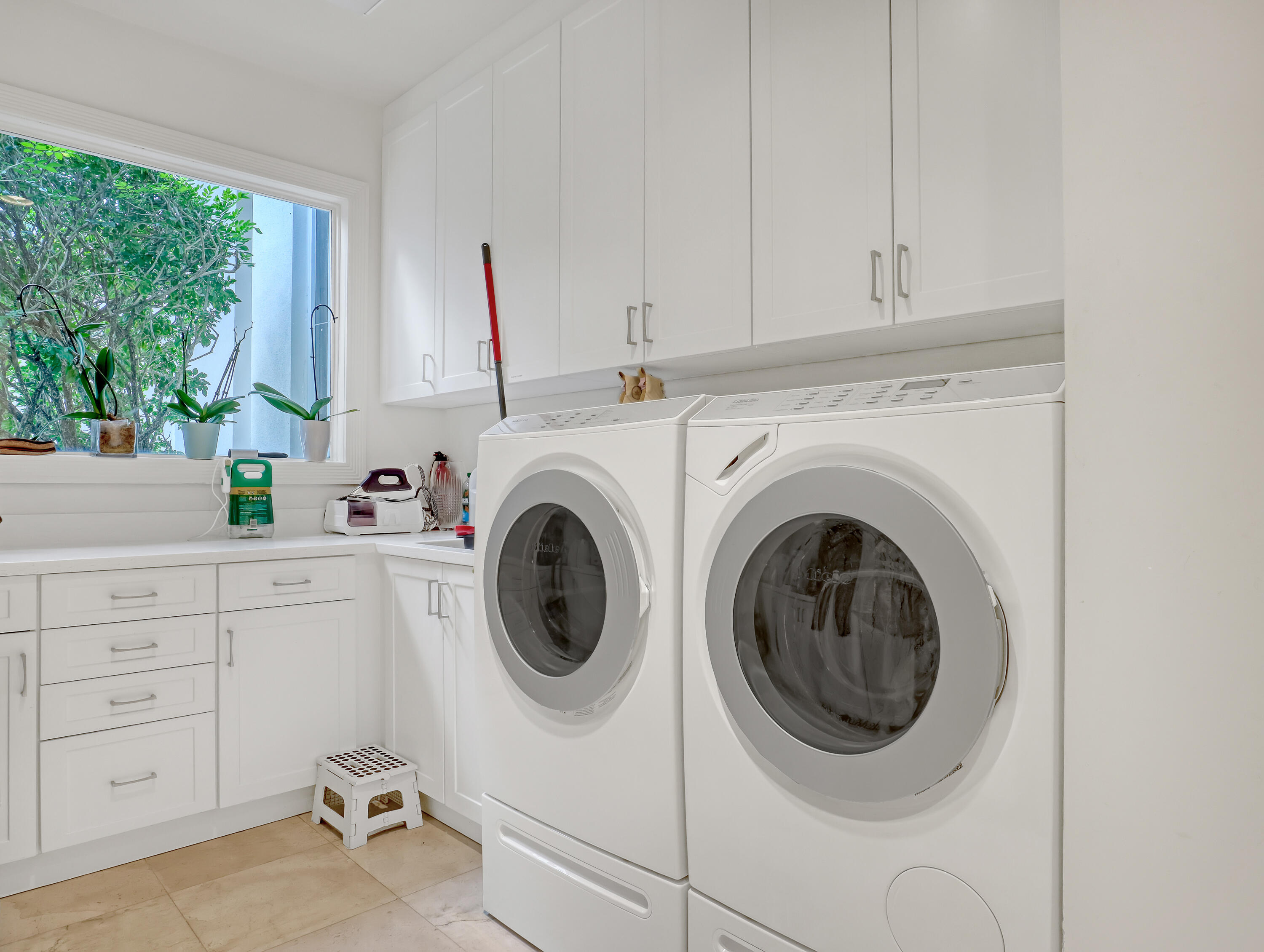 7207 Valencia Drive Boca Raton, FL 33433 - Photo 26 of 32 a utility room with sink dryer and washer