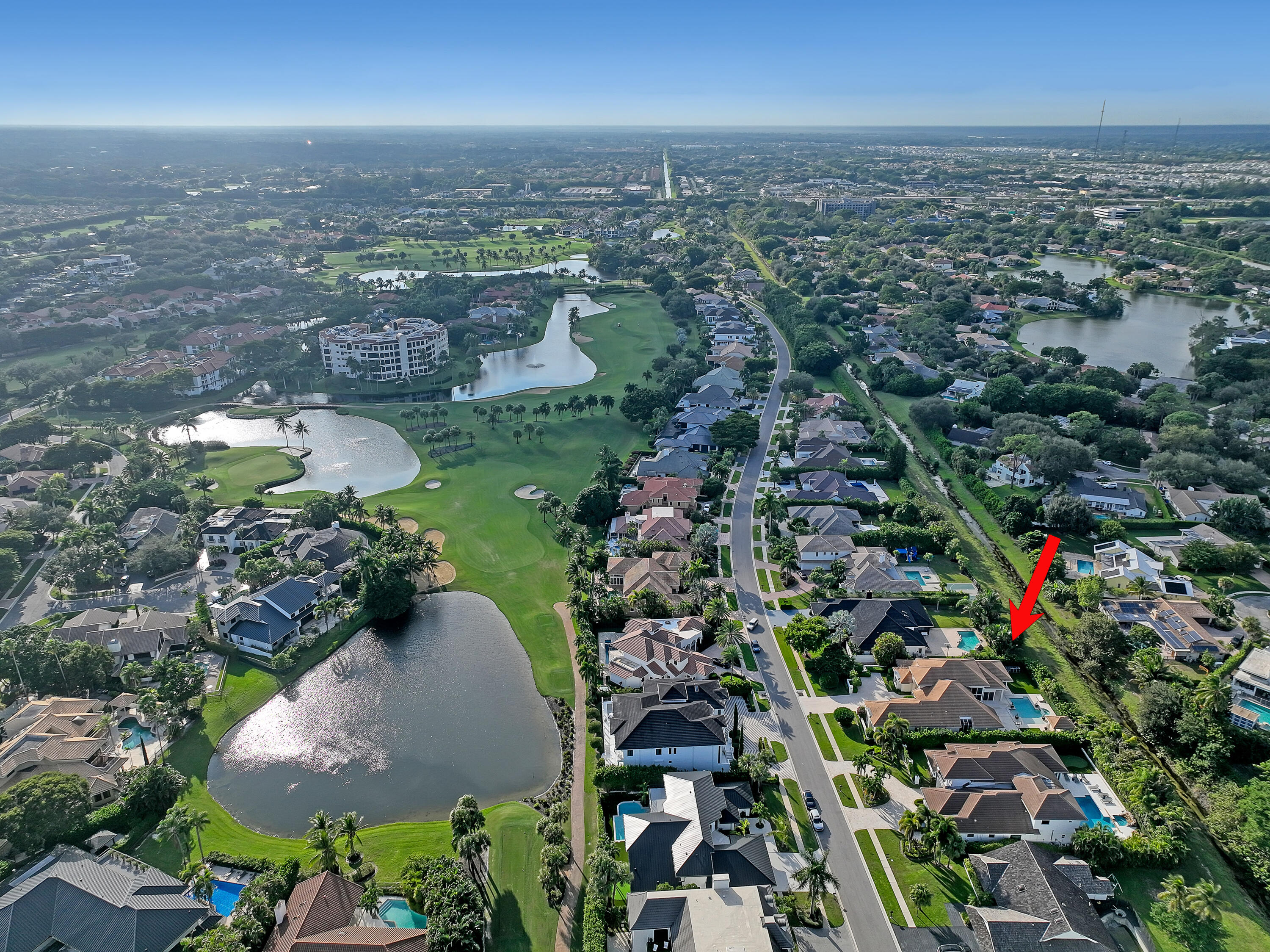 7207 Valencia Drive Boca Raton, FL 33433 - Photo 32 of 32 an aerial view of residential houses with outdoor space and trees