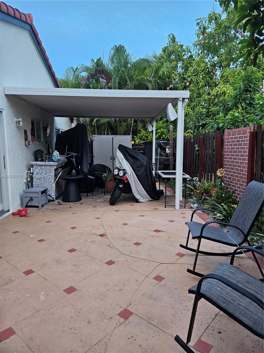 16314 Southwest 97th Street Miami, FL 33196 - Photo 37 of 41 a view of outdoor space yard and patio