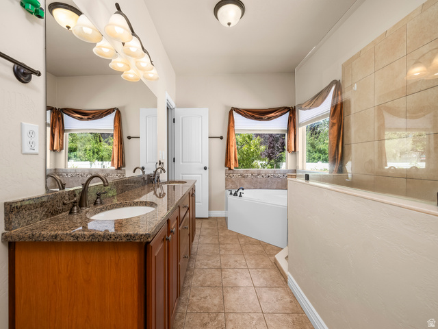 255 East 1200 North Mapleton, UT 84664 - Photo 14 of 37 Double vanity with integrated sinks and a stone-finish countertop