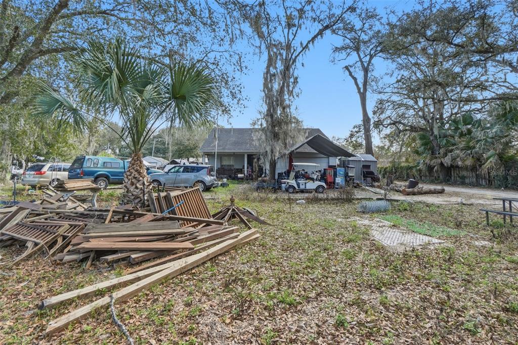 1650 East Welch Road Apopka, FL 32712 - Photo 4 of 29 a view of swimming pool with sitting area and slide