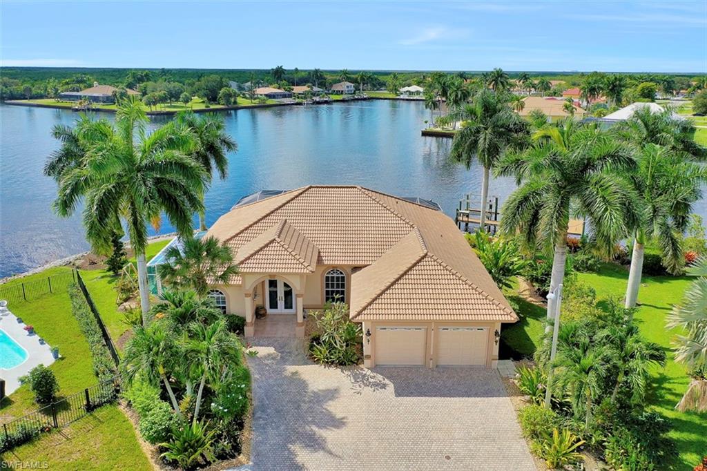 134 Windward Cay Naples, FL 34114 - Photo 13 of 35 an aerial view of a house with balcony and outdoor space