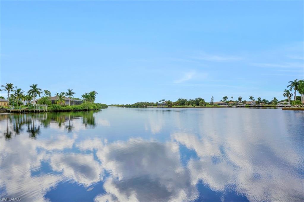 134 Windward Cay Naples, FL 34114 - Photo 24 of 35 a view of a lake