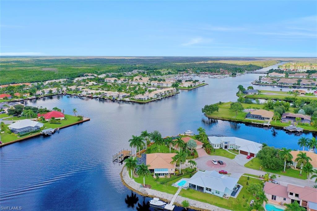 134 Windward Cay Naples, FL 34114 - Photo 5 of 35 an aerial view of a house with outdoor space