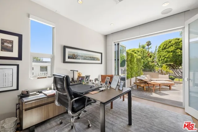 a view of a tables and chairs in the patio