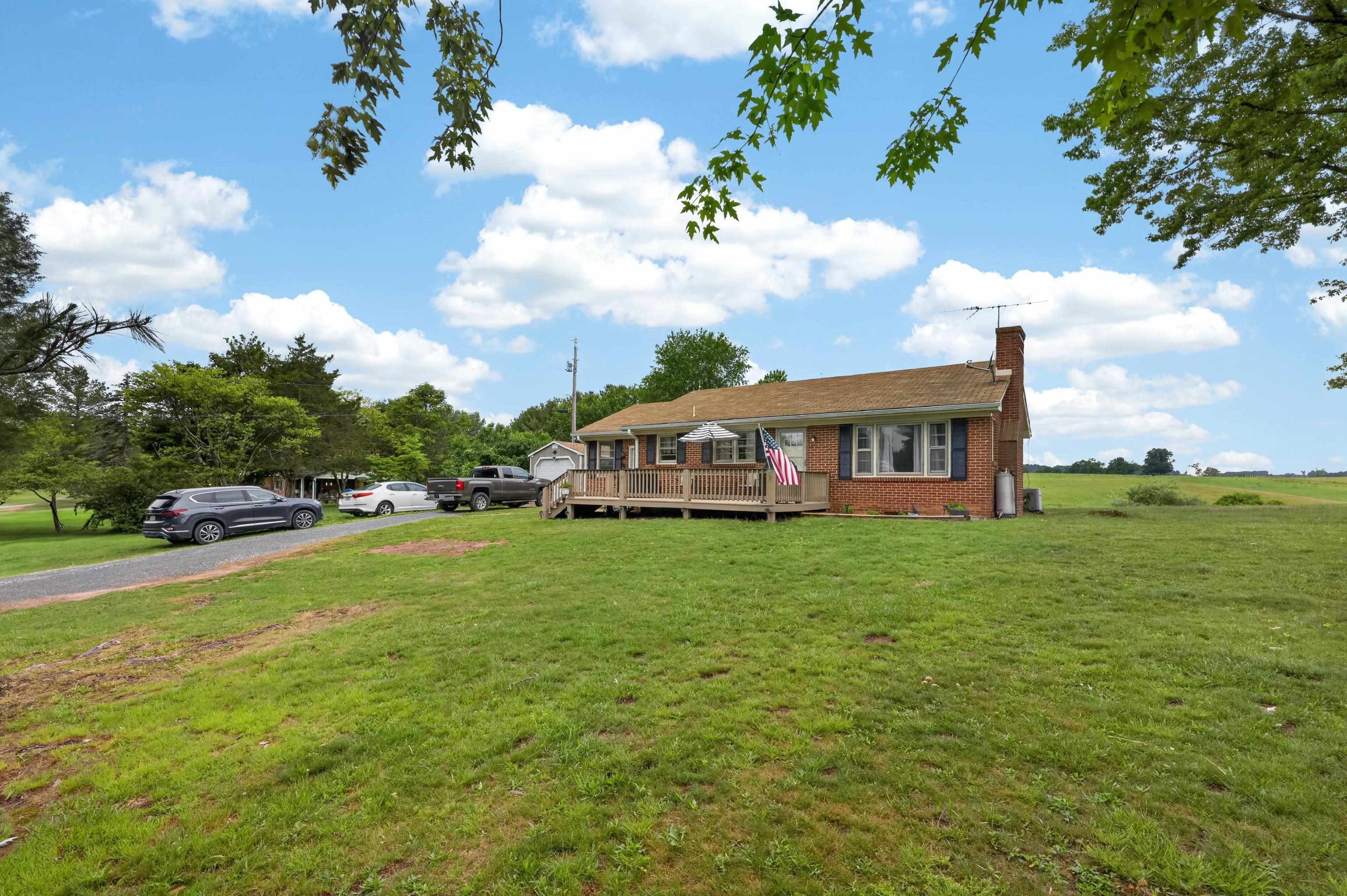 7827 Lee Highway Raphine, VA 24472 - Photo 6 of 62 a view of a house with a big yard