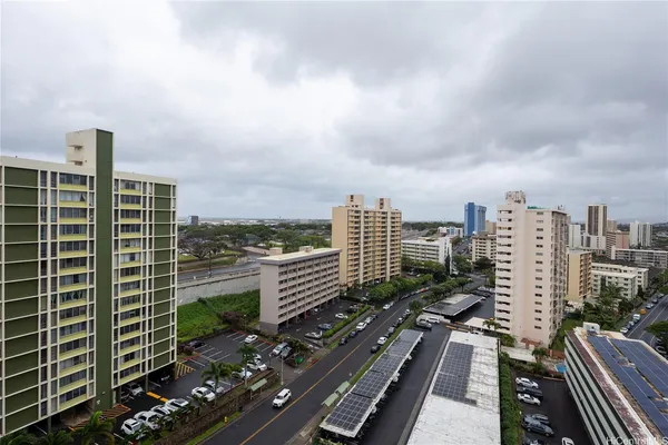 a view of a city with tall buildings