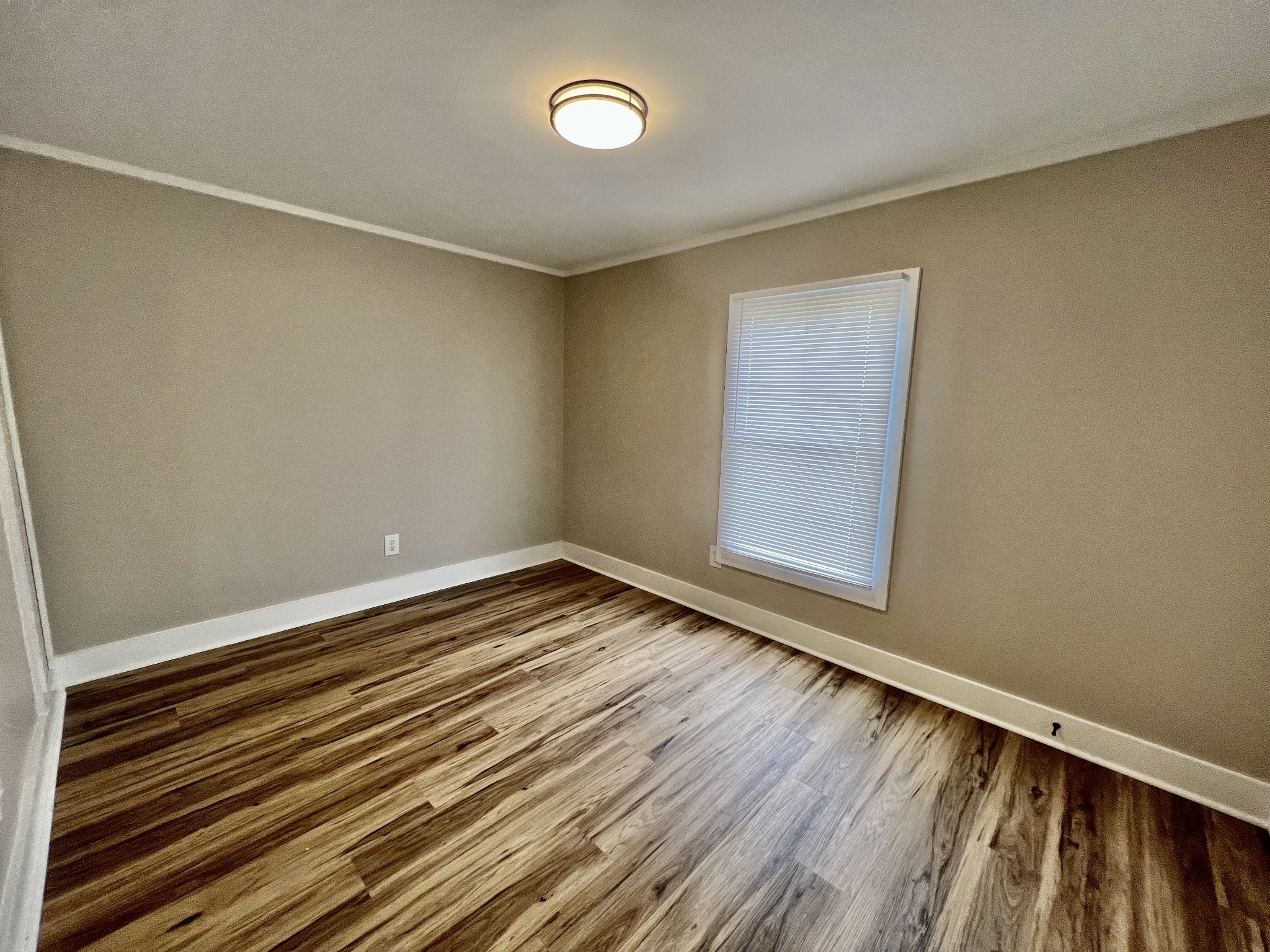 114 Barber Road Unionville, TN 37180 - Photo 20 of 36 a view of room with wooden floor