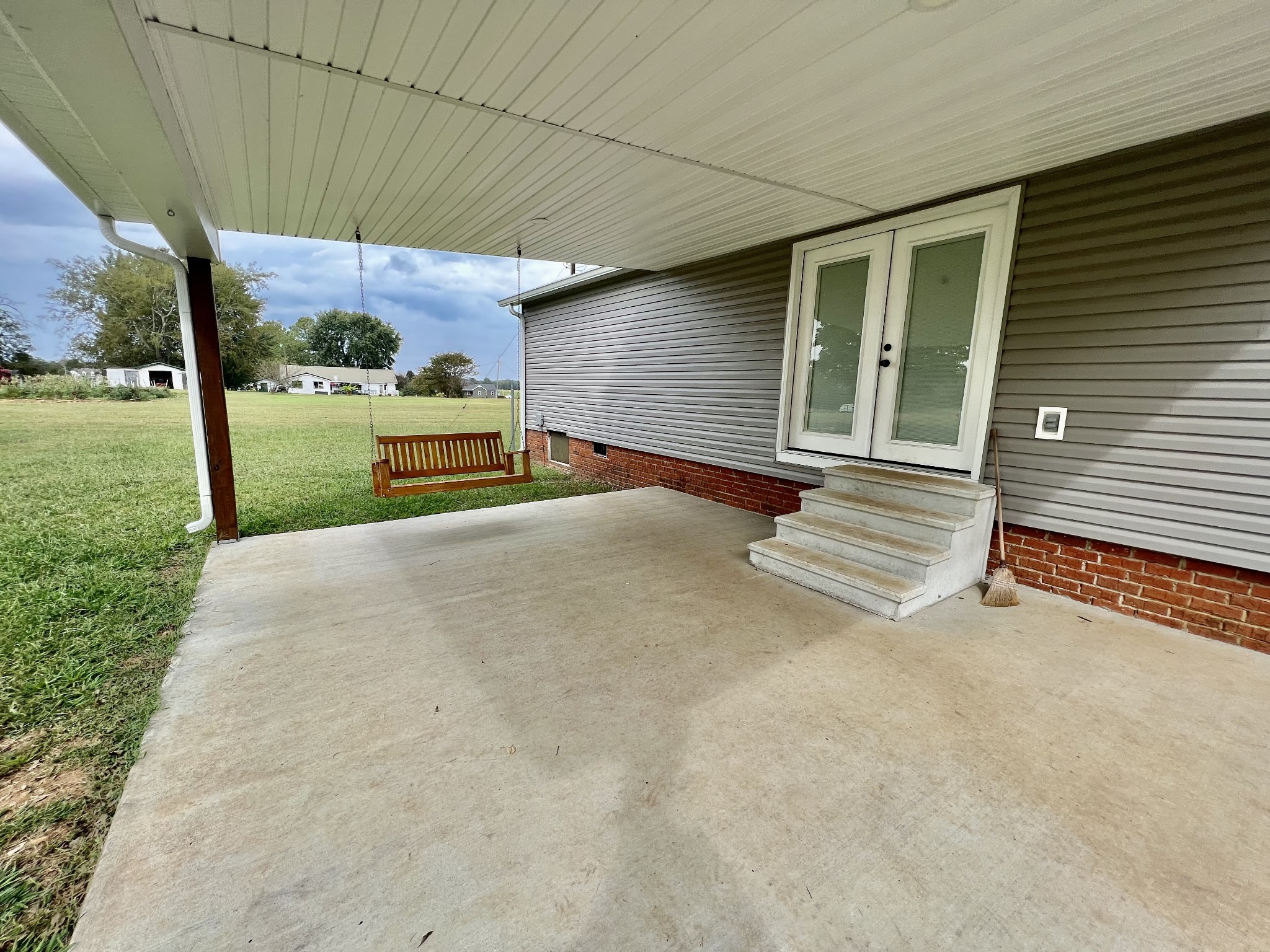 114 Barber Road Unionville, TN 37180 - Photo 32 of 36 a view of a house with backyard and porch