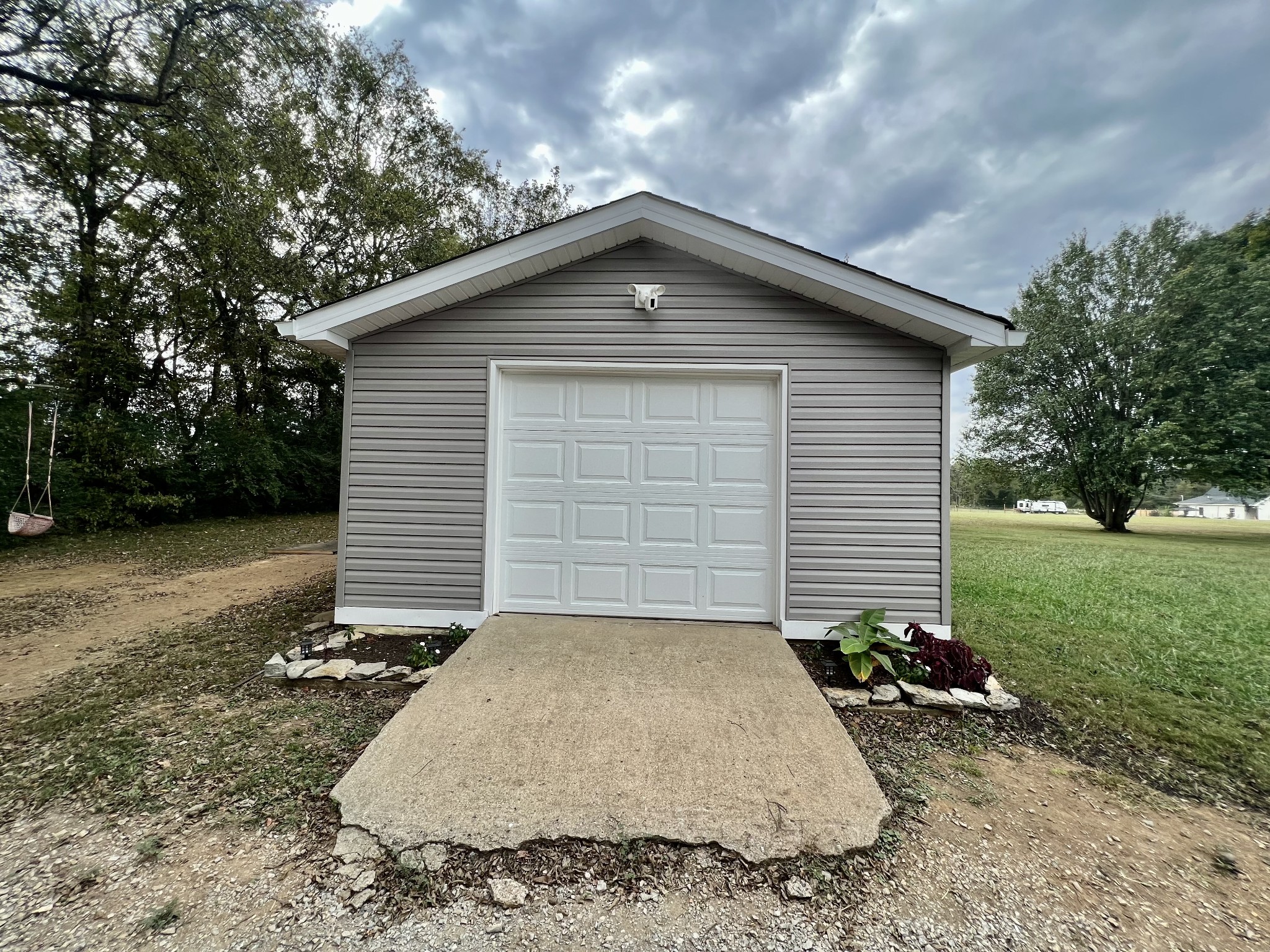 114 Barber Road Unionville, TN 37180 - Photo 34 of 36 a view of a house with a yard