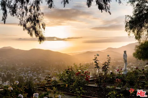 a view of a city with a mountain