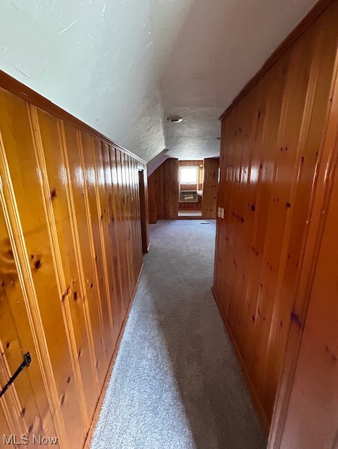 1287 Churchill Road Lyndhurst, OH 44124 - Photo 19 of 27 Hallway on the 2nd floor with new carpet, lofted ceiling, and wood walls