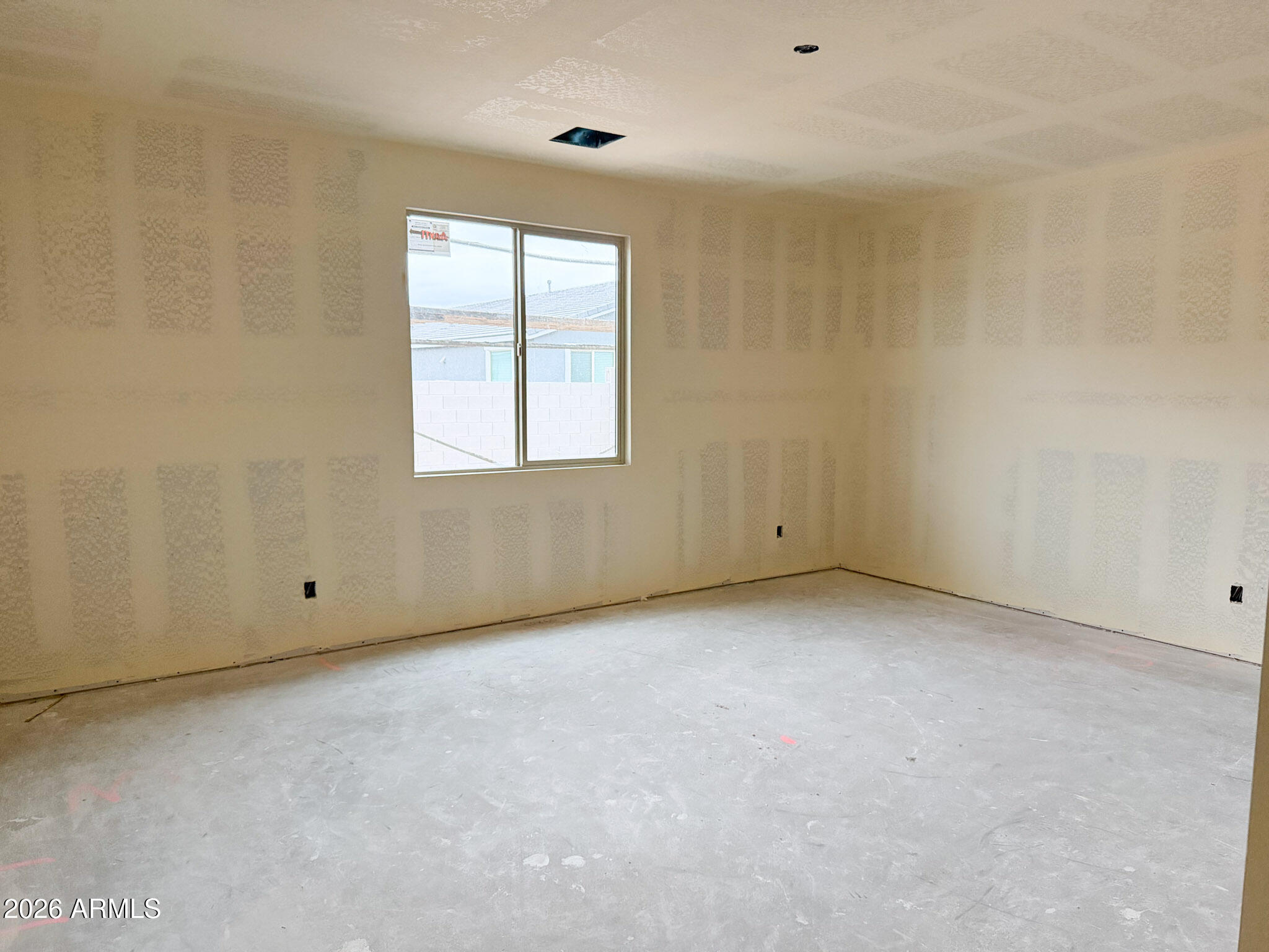5530 West Hayduk Road Laveen, AZ 85339 - Photo 13 of 30 an empty room with a window