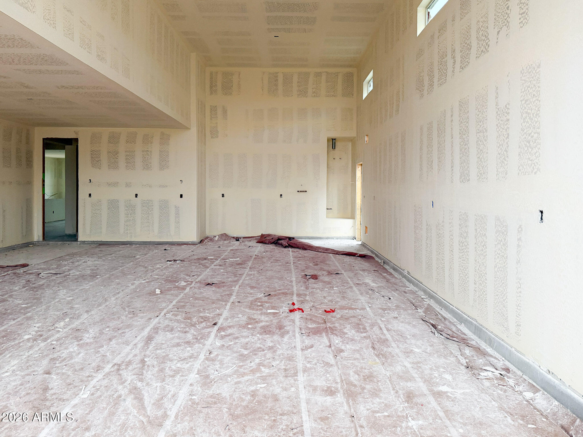 5530 West Hayduk Road Laveen, AZ 85339 - Photo 17 of 30 a view of a room with a wooden floor
