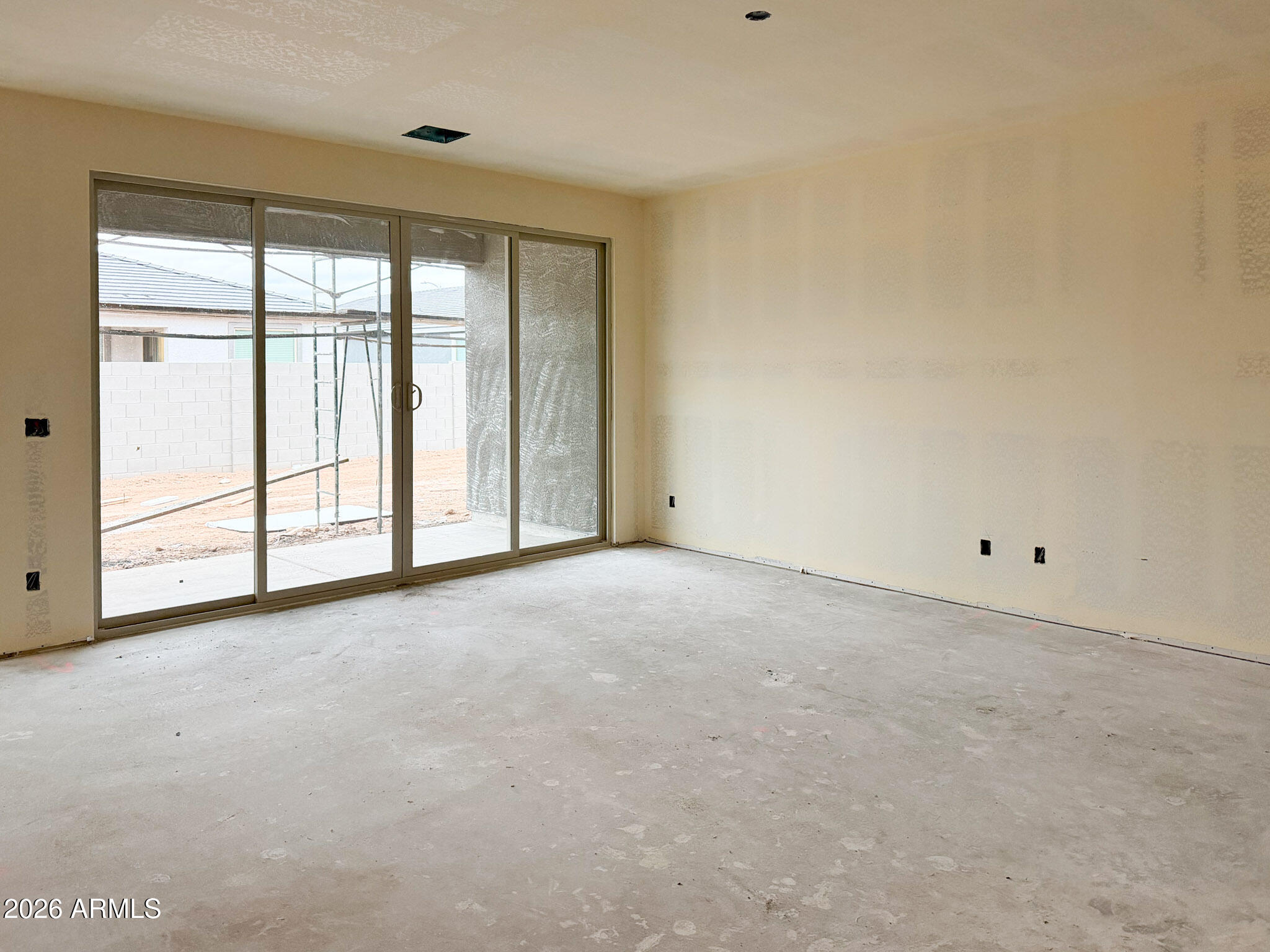 5530 West Hayduk Road Laveen, AZ 85339 - Photo 5 of 30 a view of an empty room with a window