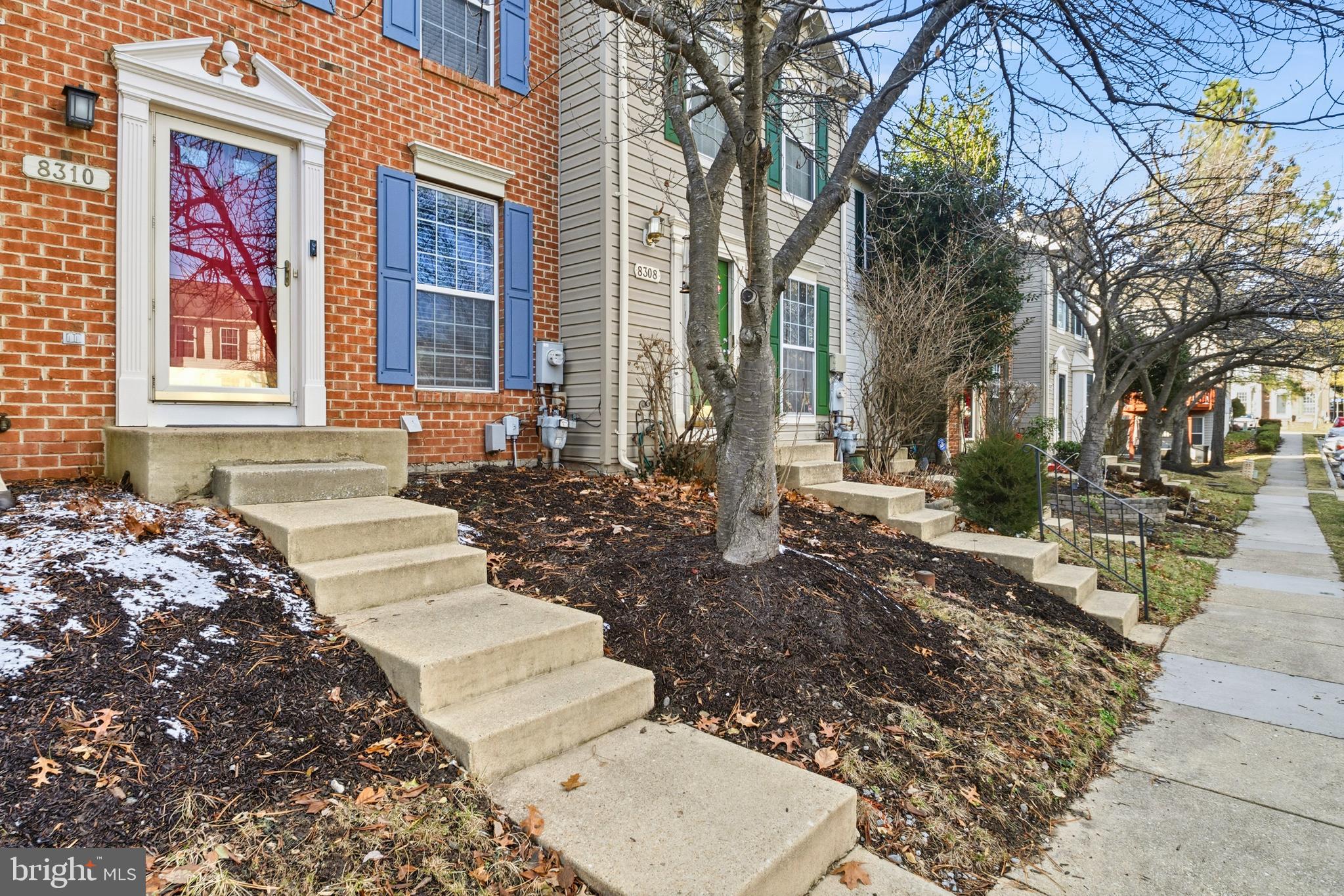 8310 Water Lily Way Laurel, MD 20724 - Photo 21 of 31 a front view of a house with a yard