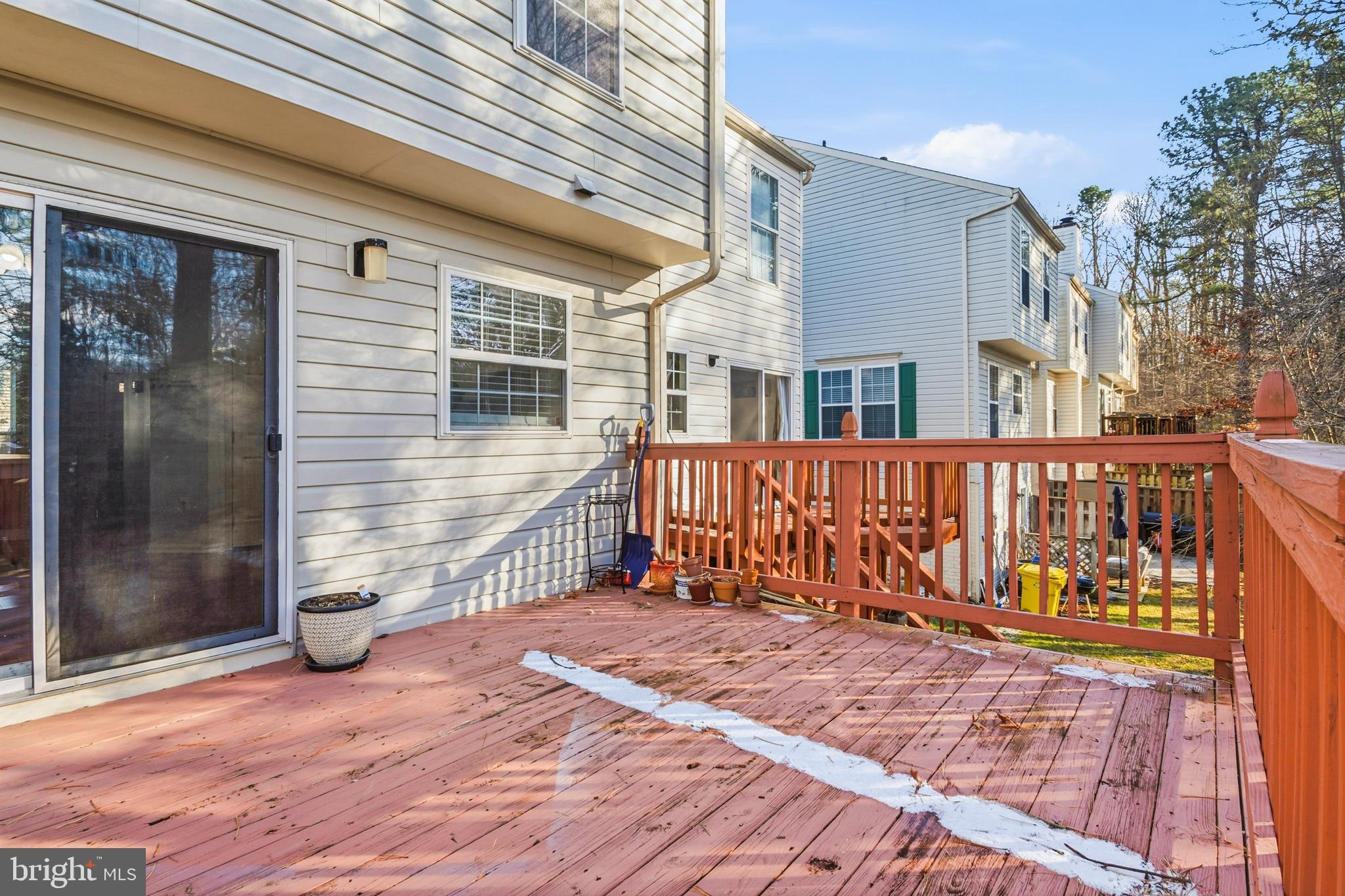 8310 Water Lily Way Laurel, MD 20724 - Photo 24 of 31 a view of a wooden door with a bench