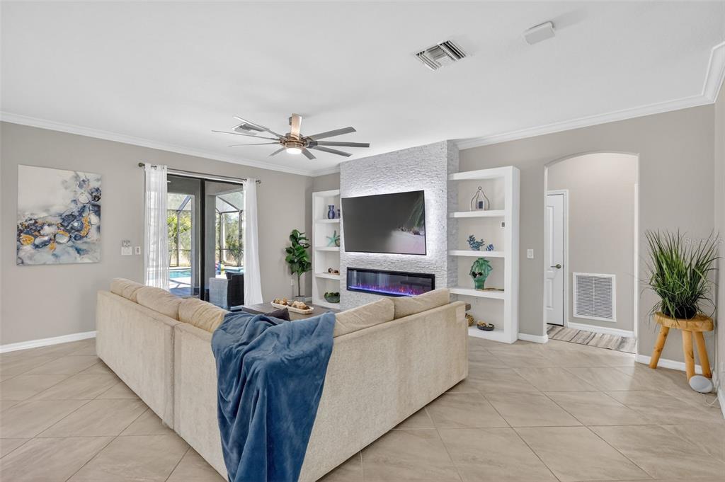 17619 Blue Rdg Place Bradenton, FL 34211 - Photo 13 of 98 a living room with furniture and a flat screen tv