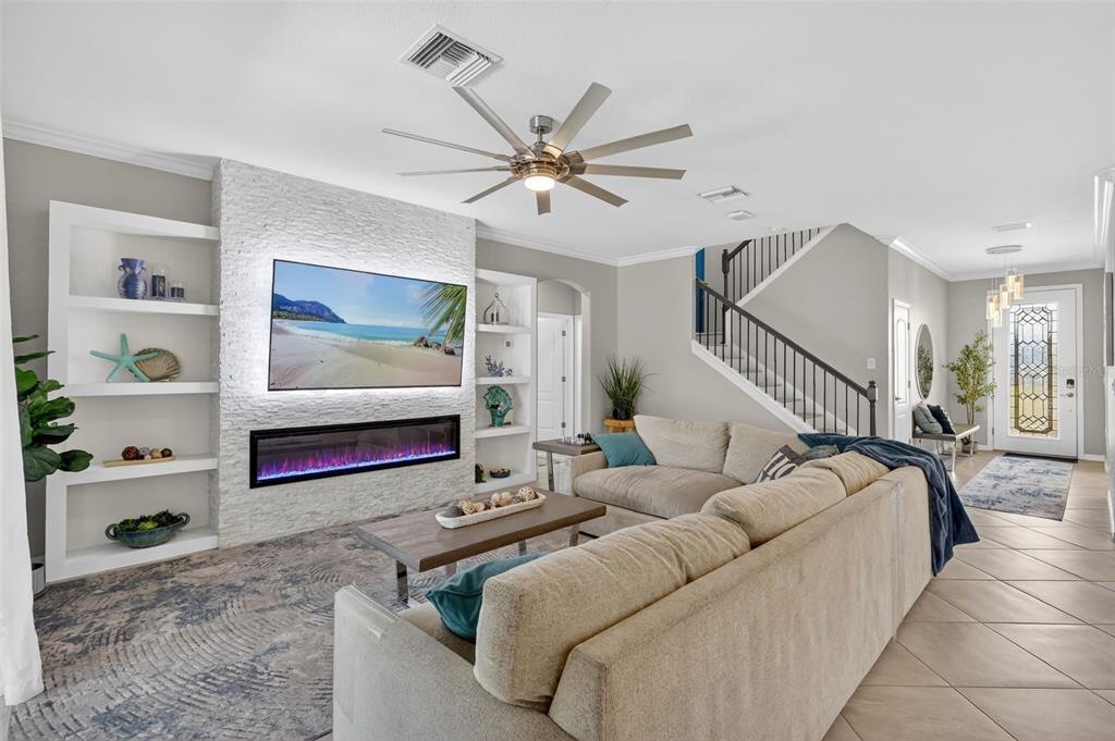 17619 Blue Rdg Place Bradenton, FL 34211 - Photo 14 of 98 a living room with furniture gym equipment and a rug