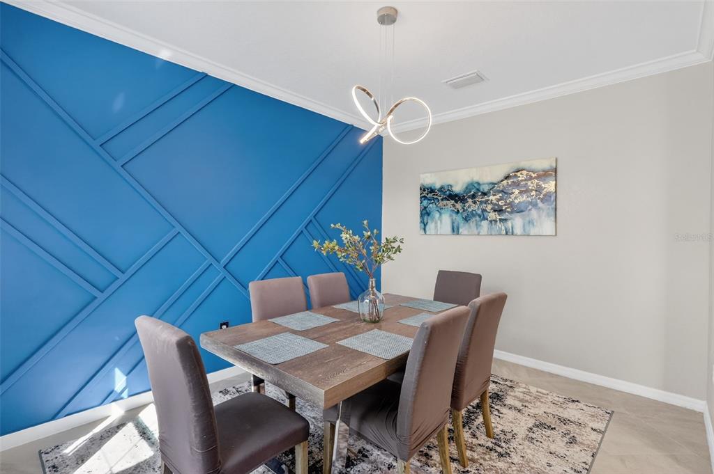17619 Blue Rdg Place Bradenton, FL 34211 - Photo 19 of 98 a dining room with furniture and wooden floor