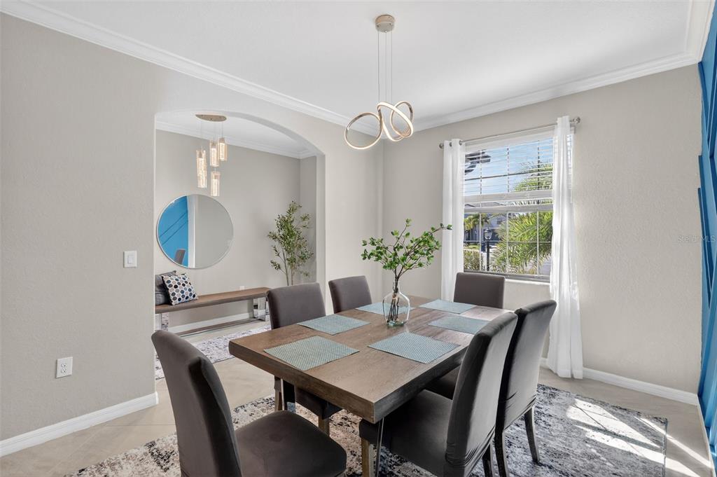 17619 Blue Rdg Place Bradenton, FL 34211 - Photo 20 of 98 a view of a dining room with furniture window and wooden floor