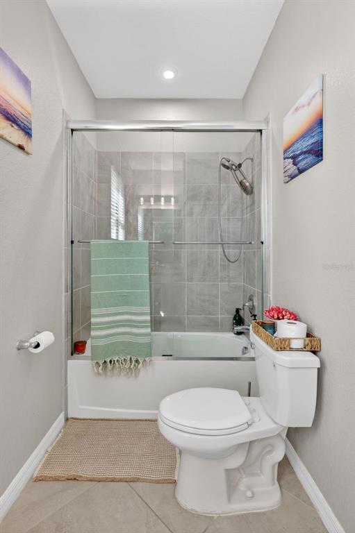 17619 Blue Rdg Place Bradenton, FL 34211 - Photo 26 of 98 a bathroom with a toilet a sink and bathtub