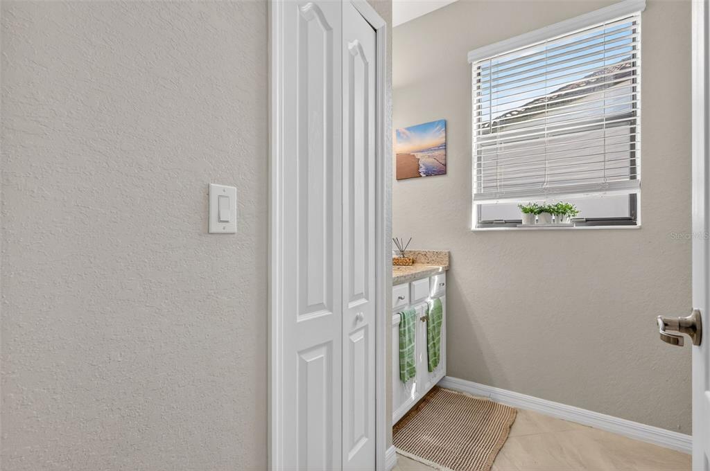 17619 Blue Rdg Place Bradenton, FL 34211 - Photo 27 of 98 a view of a hallway with windows