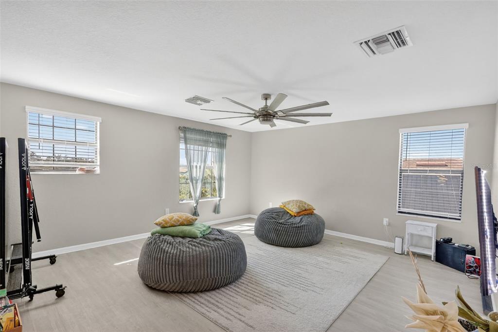 17619 Blue Rdg Place Bradenton, FL 34211 - Photo 30 of 98 a living room with furniture and a window