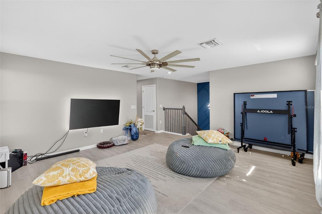 17619 Blue Rdg Place Bradenton, FL 34211 - Photo 31 of 98 a bedroom with furniture and a flat screen tv