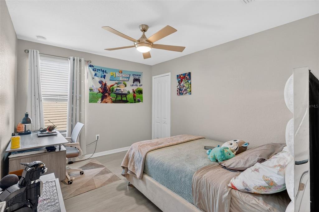 17619 Blue Rdg Place Bradenton, FL 34211 - Photo 32 of 98 a bedroom with a bed and a window