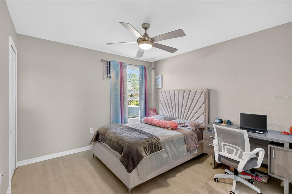 17619 Blue Rdg Place Bradenton, FL 34211 - Photo 35 of 98 a bedroom with a bed and a desk