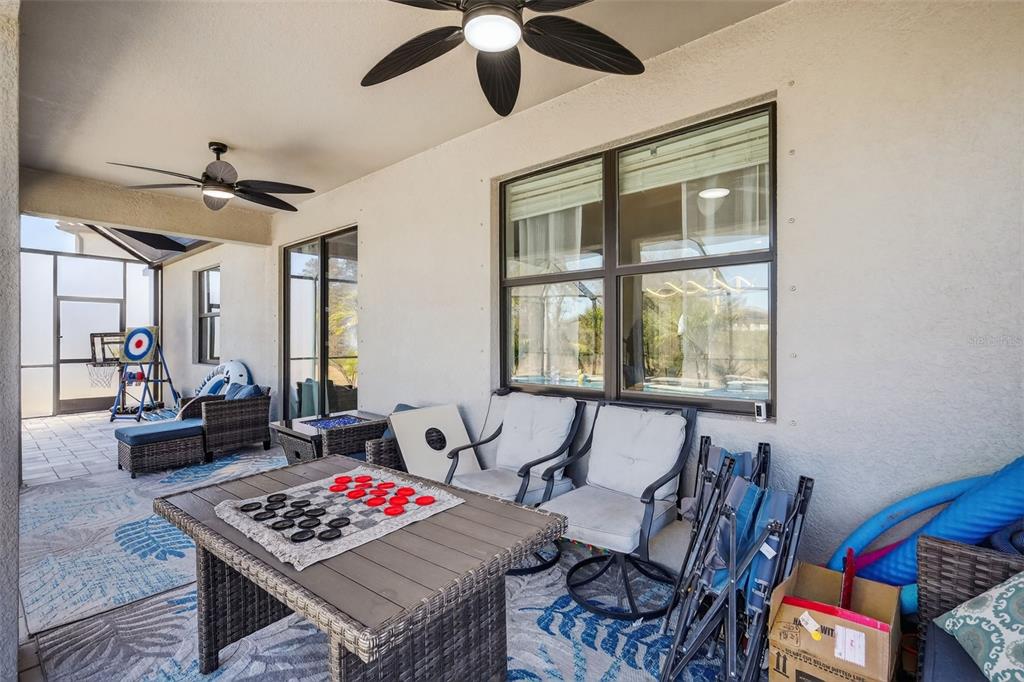 17619 Blue Rdg Place Bradenton, FL 34211 - Photo 49 of 98 a living room with furniture and a window