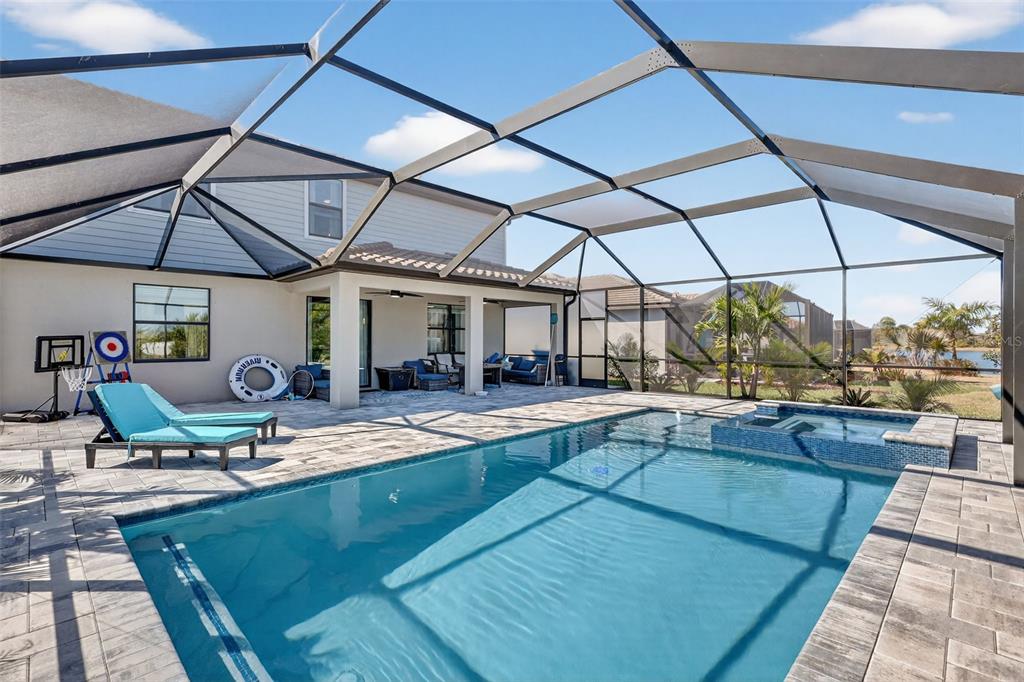 17619 Blue Rdg Place Bradenton, FL 34211 - Photo 53 of 98 a view of a swimming pool with a patio