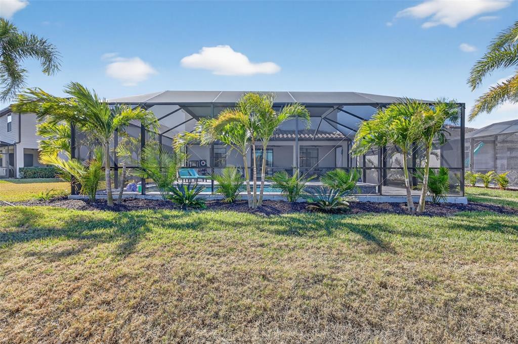 17619 Blue Rdg Place Bradenton, FL 34211 - Photo 55 of 98 a view of a house with backyard and sitting area