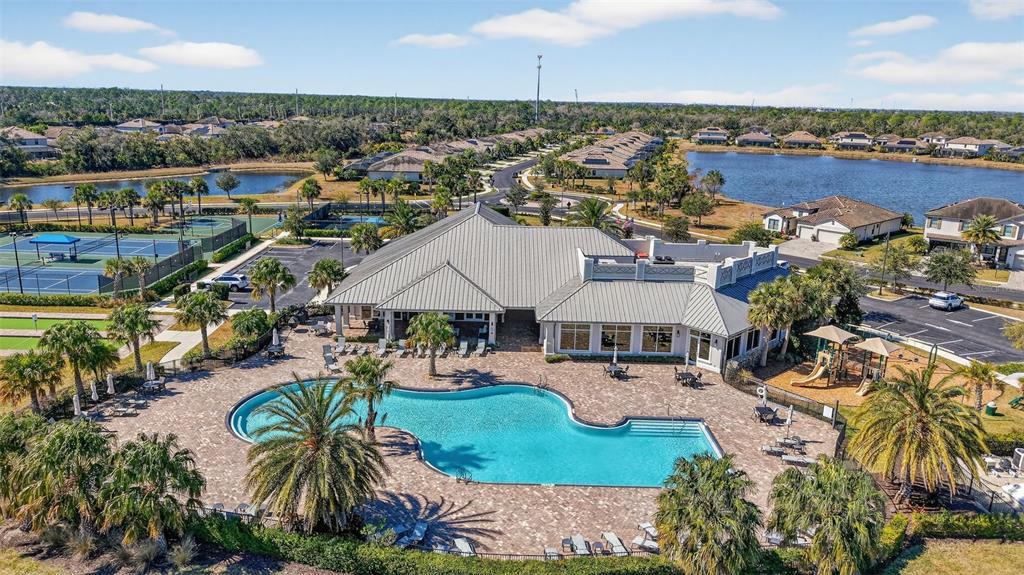 17619 Blue Rdg Place Bradenton, FL 34211 - Photo 85 of 98 an aerial view of residential houses with outdoor space and lake view