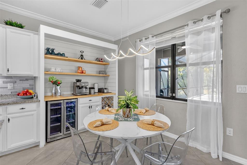 17619 Blue Rdg Place Bradenton, FL 34211 - Photo 9 of 98 a view of a dining room with furniture window and outside view