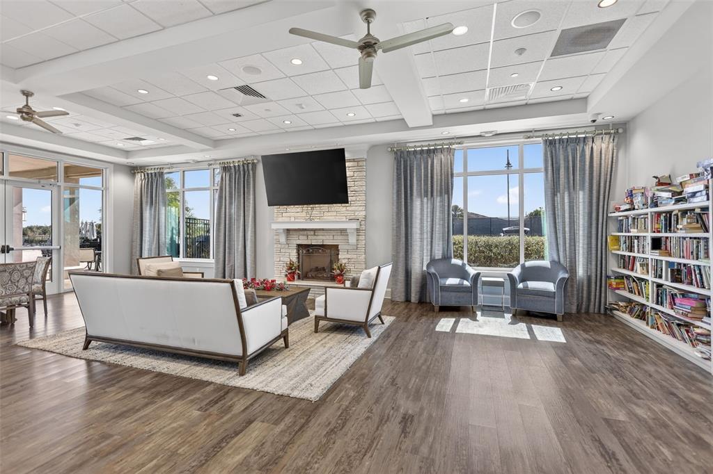 17619 Blue Rdg Place Bradenton, FL 34211 - Photo 96 of 98 a living room with furniture and a fireplace