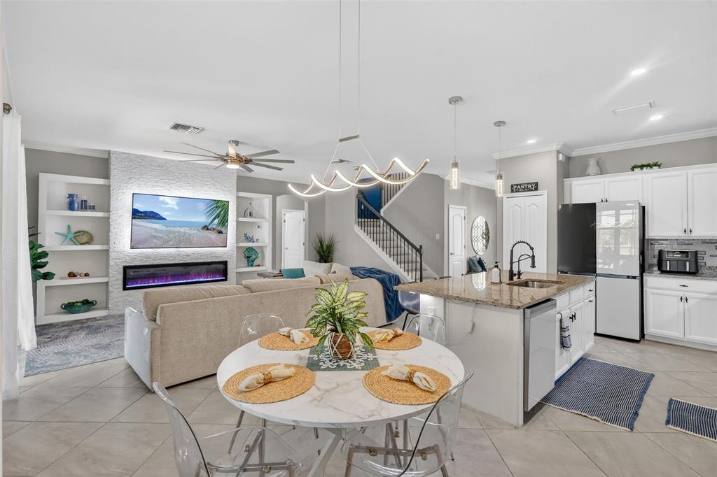 17619 Blue Rdg Place Bradenton, FL 34211 - Photo 10 of 98 a living room with furniture and a flat screen tv