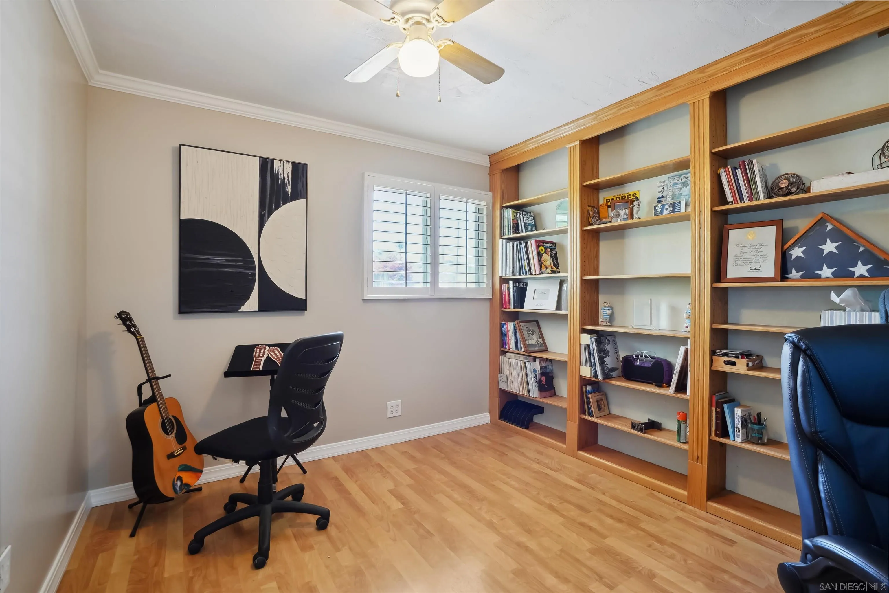 9537 East Hartland Circle Santee, CA 92071 - Photo 14 of 42 a workspace with a bookshelf