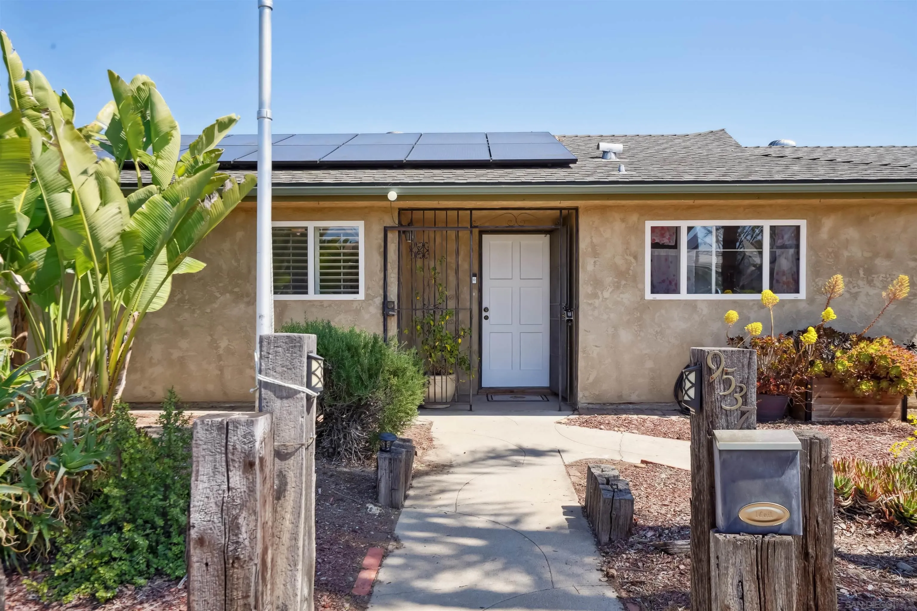 9537 East Hartland Circle Santee, CA 92071 - Photo 24 of 42 a front view of a house with a porch