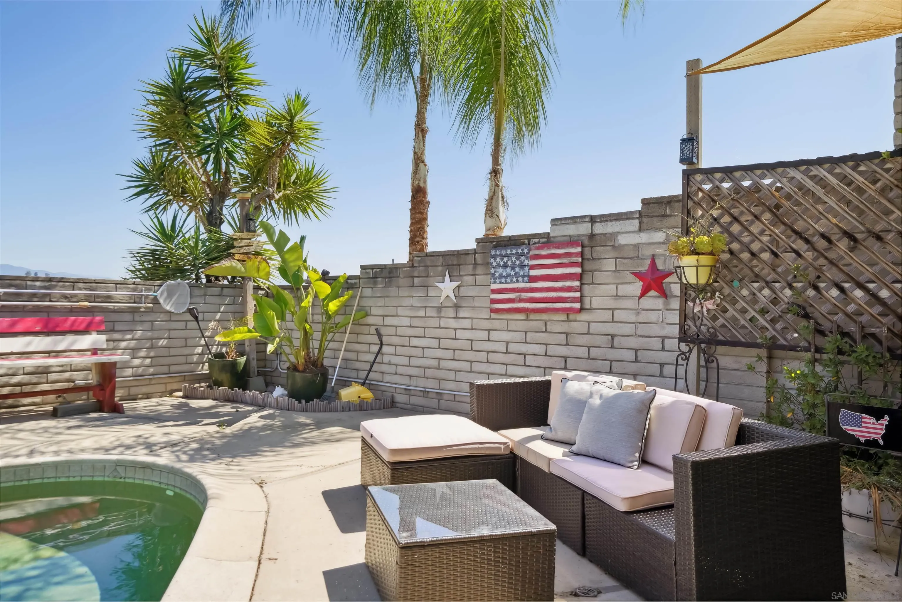 9537 East Hartland Circle Santee, CA 92071 - Photo 25 of 42 a backyard of a house with seating space