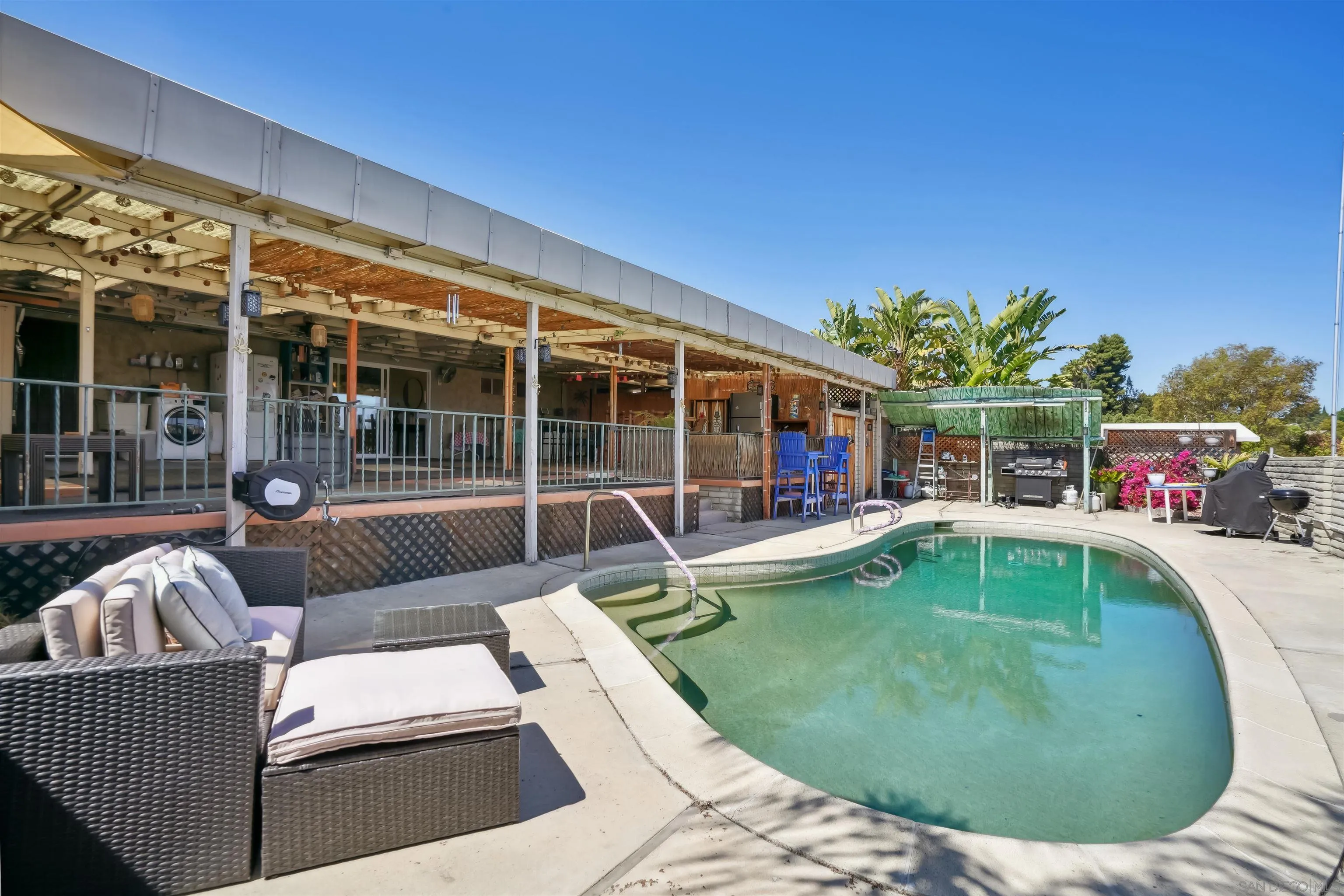 9537 East Hartland Circle Santee, CA 92071 - Photo 26 of 42 a view of a house with swimming pool and porch