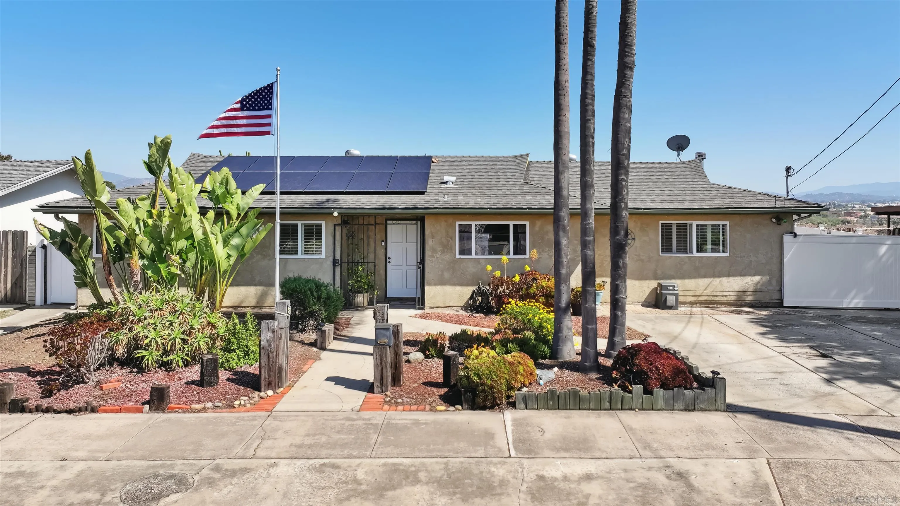 9537 East Hartland Circle Santee, CA 92071 - Photo 39 of 42 a front view of a house with a sitting area