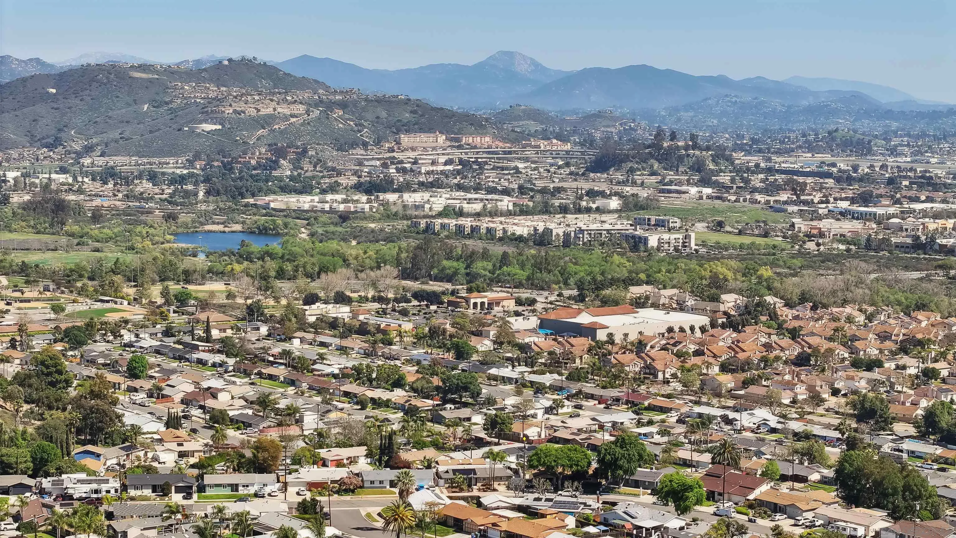 9537 East Hartland Circle Santee, CA 92071 - Photo 42 of 42 an aerial view of residential houses with outdoor space and trees